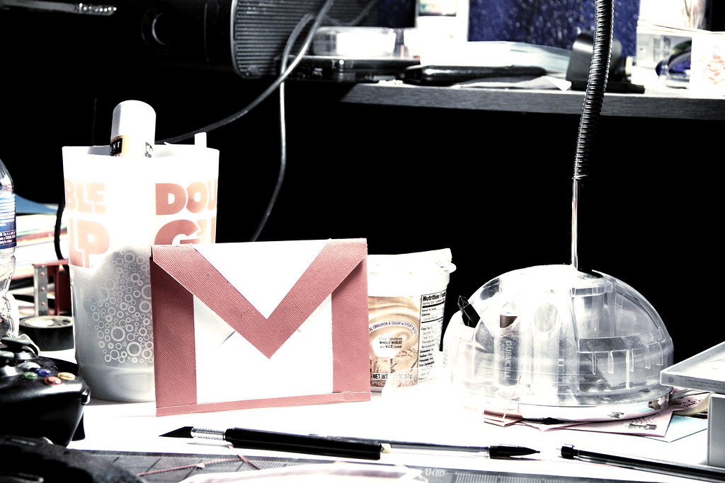Overdue notice envelope on a desk