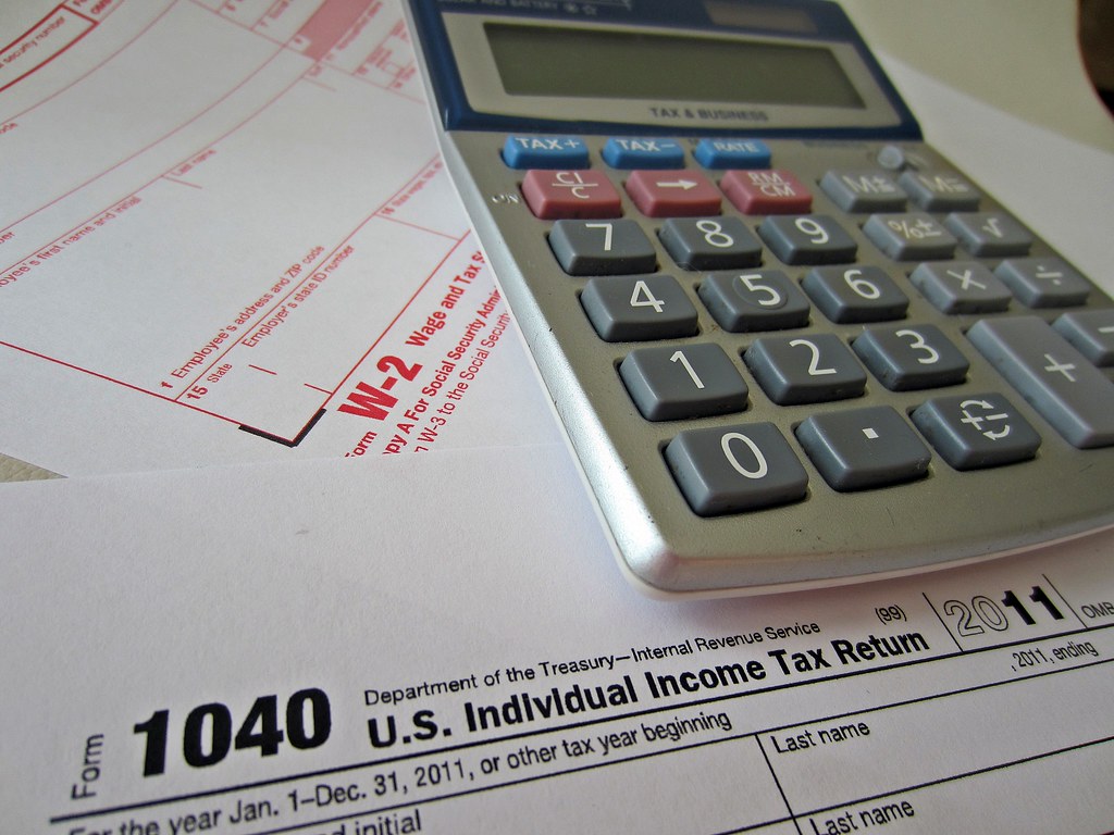 Payroll tax documents on a desk